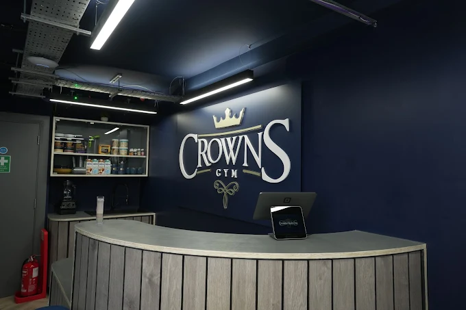 Crowns Gym reception area with branded signage